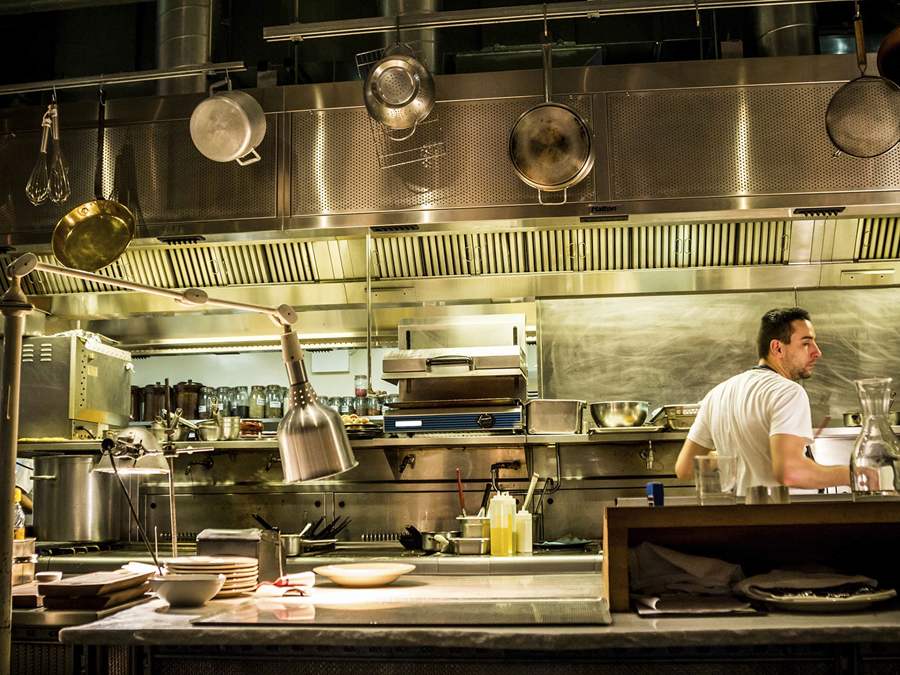 Chef in open kitchen